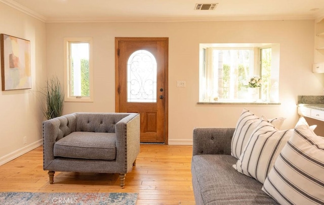 14816 Covello St, Van Nuys, CA 91405 - foyer featuring light wood finished floors, ornamental molding, and baseboards