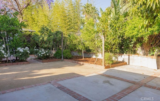 14816 Covello St, Van Nuys, CA 91405 - view of patio / terrace with a garden