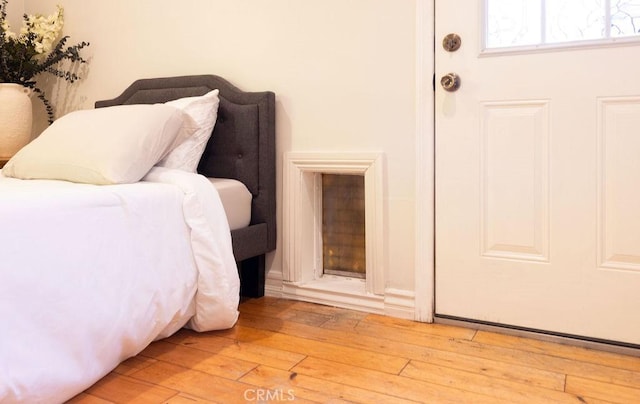 14816 Covello St, Van Nuys, CA 91405 - bedroom with light wood-type flooring