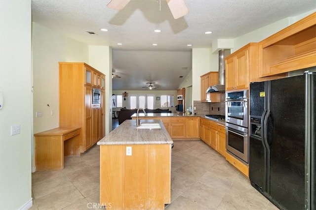 9050 Ponderosa Rd, Pinon Hills, CA 92372 - kitchen featuring appliances with stainless steel finishes, a ceiling fan, a sink, vaulted ceiling, and backsplash