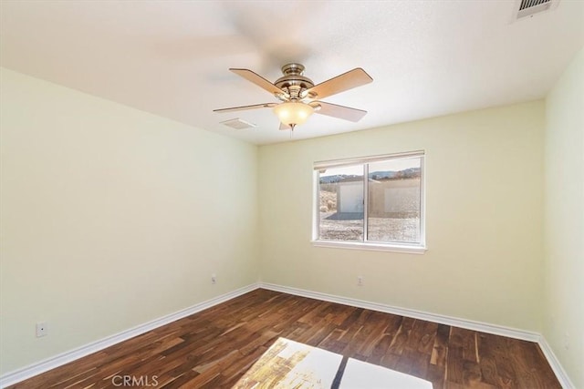 9050 Ponderosa Rd, Pinon Hills, CA 92372 - unfurnished room with baseboards, wood finished floors, and ceiling fan