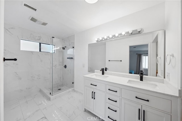 44310 Calle Bernardo, Temecula, CA 92590 - bathroom with a marble finish shower, double vanity, and marble finish flooring