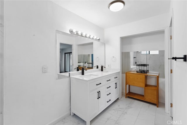 44310 Calle Bernardo, Temecula, CA 92590 - bathroom with marble finish floors, double vanity, and baseboards
