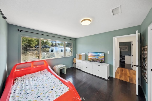 44310 Calle Bernardo, Temecula, CA 92590 - bedroom with multiple windows, wood finished floors, and baseboards