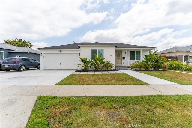 1422 S Exmoor Ave, Compton, CA 90220 - single story home featuring stucco siding, an attached garage, and driveway