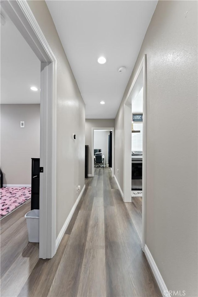 1422 S Exmoor Ave, Compton, CA 90220 - hall with wood finished floors, baseboards, and recessed lighting