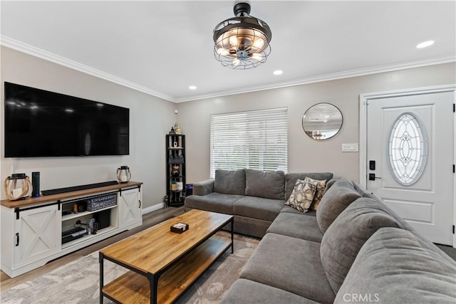 1422 S Exmoor Ave, Compton, CA 90220 - living area with light wood-type flooring, ornamental molding, recessed lighting, baseboards, and a chandelier