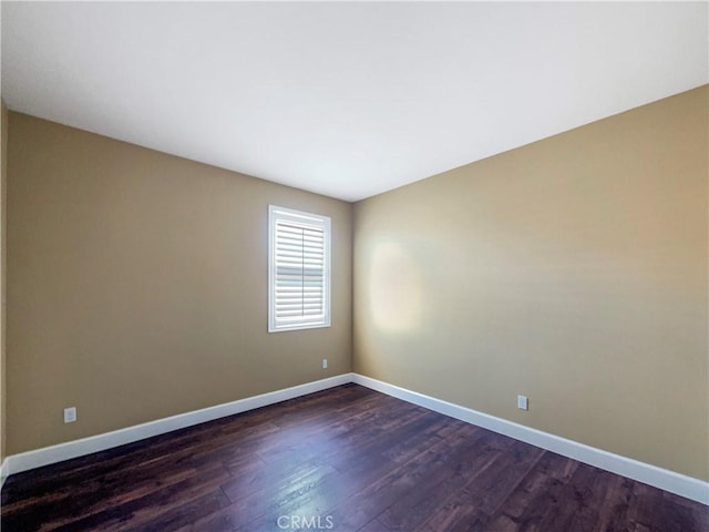 25329 Wild View Rd, Menifee, CA 92584 - spare room with dark wood-type flooring and baseboards
