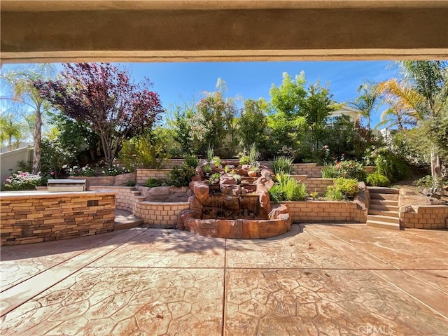 25329 Wild View Rd, Menifee, CA 92584 - view of patio featuring exterior kitchen