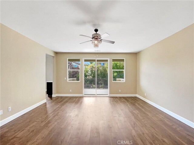 25329 Wild View Rd, Menifee, CA 92584 - unfurnished room featuring a ceiling fan, baseboards, and wood finished floors
