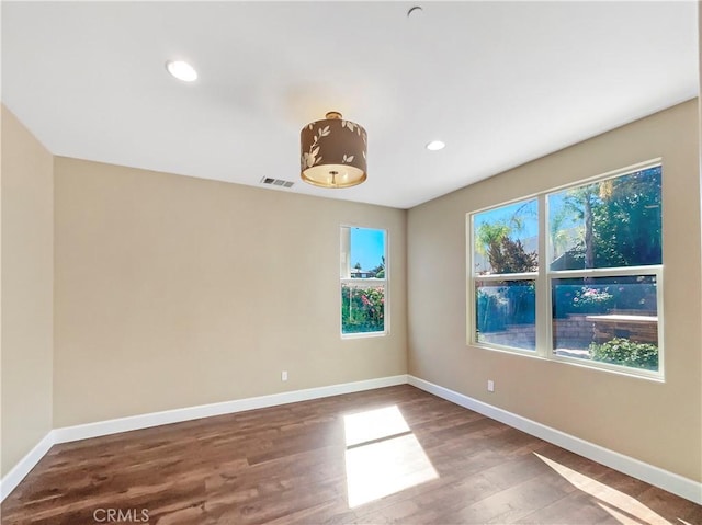 25329 Wild View Rd, Menifee, CA 92584 - spare room featuring wood finished floors, baseboards, and recessed lighting