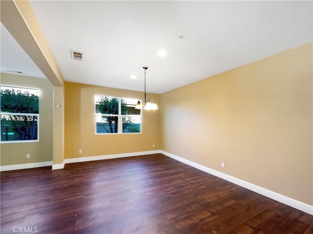 25329 Wild View Rd, Menifee, CA 92584 - spare room with a chandelier, dark wood finished floors, baseboards, and recessed lighting