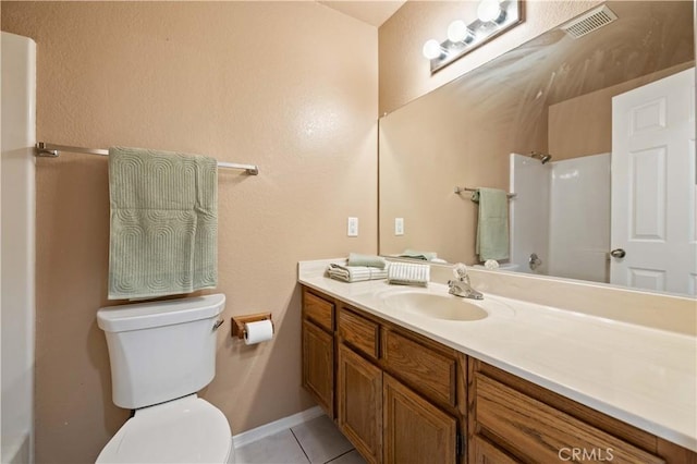 1819 Acosta Ave, Lancaster, CA 93535 - bathroom featuring toilet, vanity, tile patterned floors, and a shower