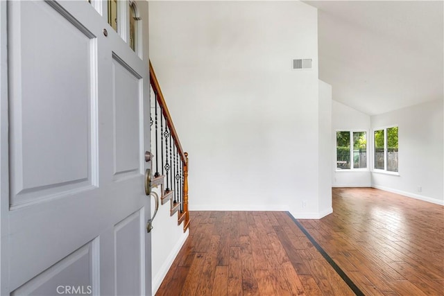 32911 Danaoak, Dana Point, CA 92629 - entrance foyer with dark wood-style floors, stairs, baseboards, and high vaulted ceiling