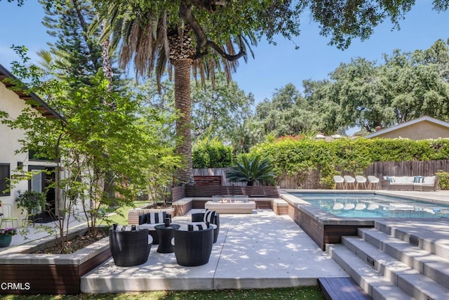 448 W Montecito Ave, Sierra Madre, CA 91024 - fenced backyard featuring an outdoor living space and a patio