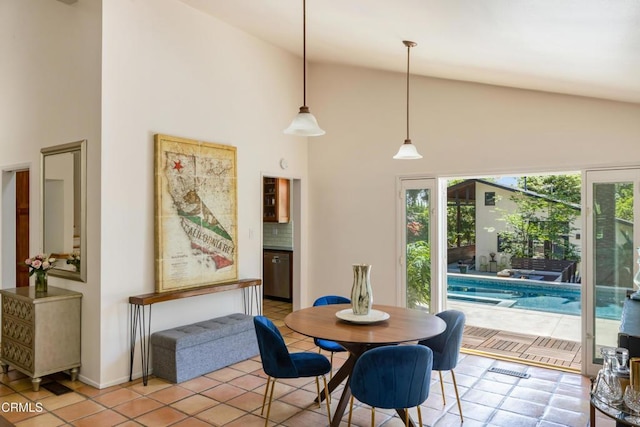 448 W Montecito Ave, Sierra Madre, CA 91024 - dining space featuring high vaulted ceiling and baseboards