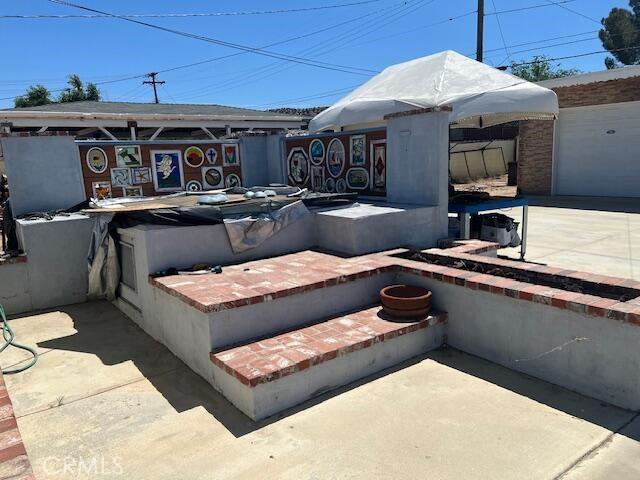 38833 Sage Tree St, Palmdale, CA 93551 - view of patio featuring an outdoor kitchen