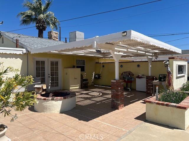 38833 Sage Tree St, Palmdale, CA 93551 - view of patio / terrace featuring french doors and a pergola