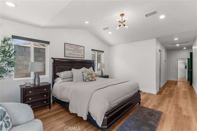 4674 Norton Pl, Riverside, CA 92506 - bedroom with vaulted ceiling, light wood-style floors, a chandelier, baseboards, and recessed lighting