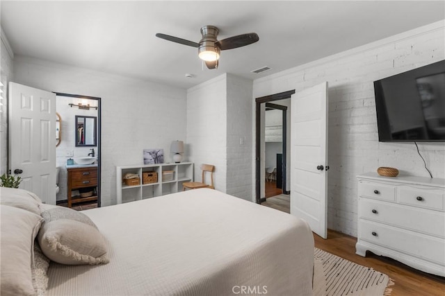 4674 Norton Pl, Riverside, CA 92506 - bedroom featuring wood finished floors, a ceiling fan, and a sink