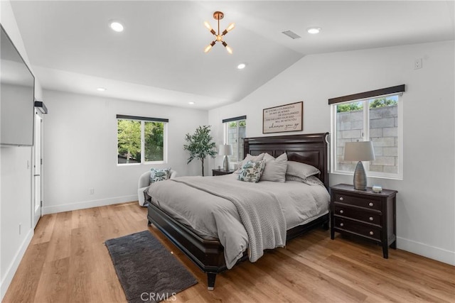 4674 Norton Pl, Riverside, CA 92506 - bedroom with lofted ceiling, light wood finished floors, baseboards, recessed lighting, and a chandelier