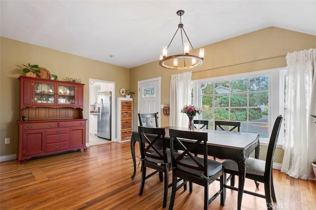 967 W 2nd Ave, Escondido, CA 92025 - dining space with a chandelier, light wood finished floors, and baseboards