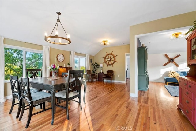 967 W 2nd Ave, Escondido, CA 92025 - dining space featuring a chandelier, light wood-type flooring, vaulted ceiling, and baseboards