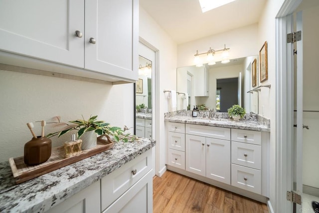 3890 Vista Campana S Unit 35, Oceanside, CA 92057 - full bath featuring vanity and wood finished floors