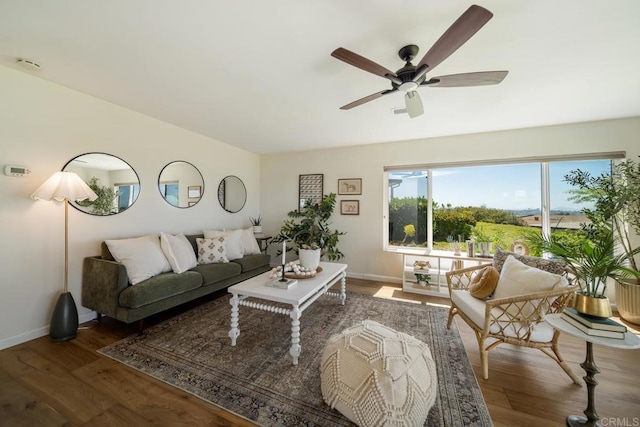 3890 Vista Campana S Unit 35, Oceanside, CA 92057 - living room with wood finished floors, baseboards, and a ceiling fan