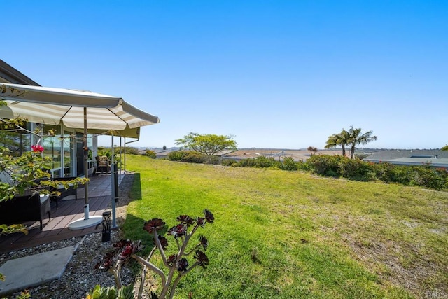 3890 Vista Campana S Unit 35, Oceanside, CA 92057 - view of grassy yard with a deck
