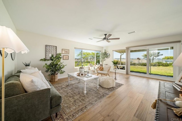 3890 Vista Campana S Unit 35, Oceanside, CA 92057 - living room with ceiling fan and wood finished floors