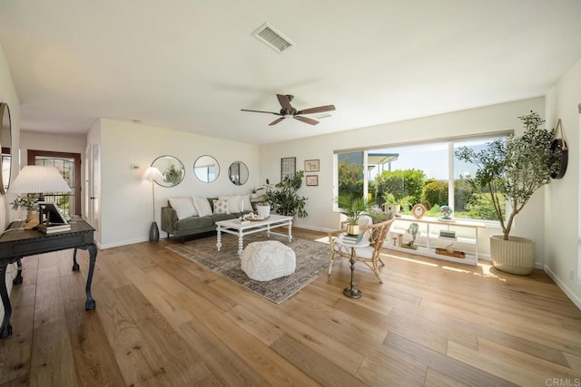 3890 Vista Campana S Unit 35, Oceanside, CA 92057 - living room with ceiling fan, wood finished floors, and baseboards