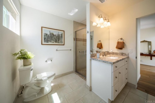 3890 Vista Campana S Unit 35, Oceanside, CA 92057 - full bath with toilet, vanity, a stall shower, tile patterned flooring, and baseboards