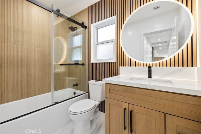 22306 Marlin Pl, Canoga Park, CA 91303 - bathroom featuring vanity, shower / bath combination with glass door, and toilet