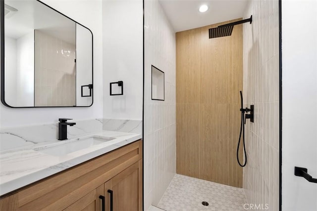 22306 Marlin Pl, Canoga Park, CA 91303 - bathroom with vanity, a tile shower, and recessed lighting