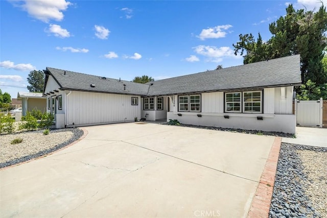 22306 Marlin Pl, Canoga Park, CA 91303 - single story home with a shingled roof, driveway, and a patio