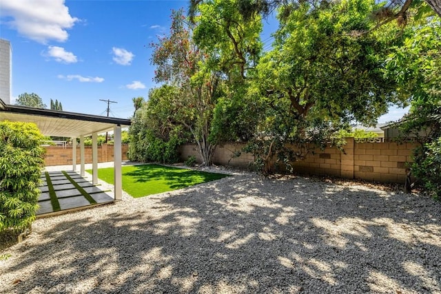 22306 Marlin Pl, Canoga Park, CA 91303 - fenced backyard featuring a patio