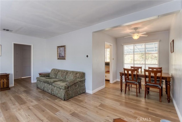 2107 Cyril Ave, Los Angeles, CA 90032 - living room featuring light wood-style flooring, a ceiling fan, and baseboards