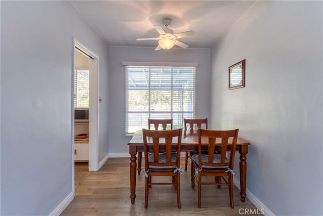 2107 Cyril Ave, Los Angeles, CA 90032 - dining room with a ceiling fan, baseboards, and light wood-style flooring