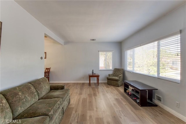 2107 Cyril Ave, Los Angeles, CA 90032 - living room featuring light wood-style floors and baseboards