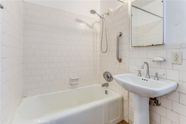 2107 Cyril Ave, Los Angeles, CA 90032 - full bathroom featuring  shower combination, tile walls, and tasteful backsplash