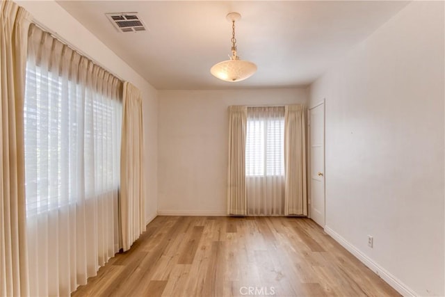 2107 Cyril Ave, Los Angeles, CA 90032 - spare room with light wood finished floors and baseboards