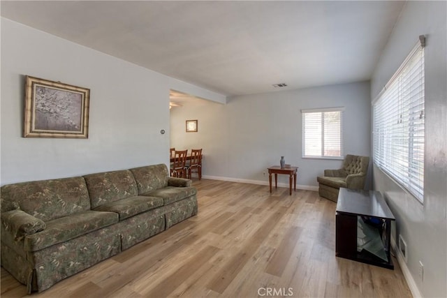2107 Cyril Ave, Los Angeles, CA 90032 - living area featuring wood finished floors and baseboards