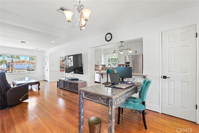 11900 Covello St, North Hollywood, CA 91605 - office with a chandelier and light wood finished floors