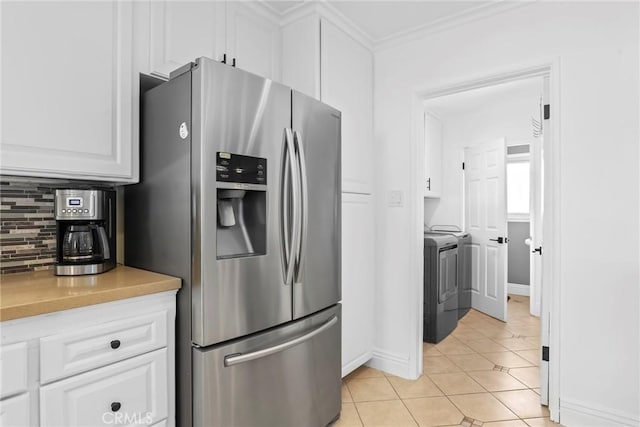 11900 Covello St, North Hollywood, CA 91605 - kitchen with stainless steel fridge with ice dispenser, separate washer and dryer, tasteful backsplash, white cabinets, and ornamental molding