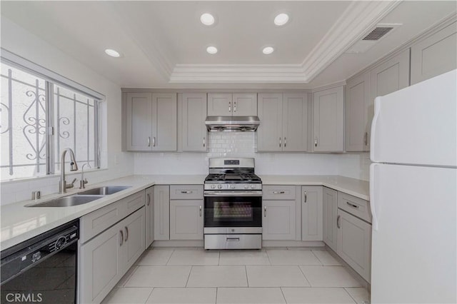 5021 Peck Rd Unit 9, El Monte, CA 91732 - kitchen with freestanding refrigerator, stainless steel gas range oven, dishwasher, under cabinet range hood, and a sink