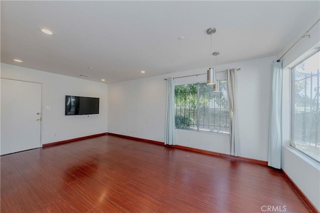 5021 Peck Rd Unit 9, El Monte, CA 91732 - unfurnished room with plenty of natural light, wood finished floors, recessed lighting, and baseboards