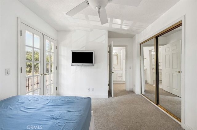 4950 Dunman Ave, Woodland Hills, CA 91364 - bedroom with french doors, carpet, ensuite bathroom, baseboards, and ceiling fan