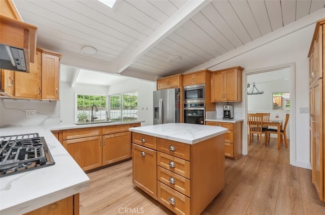 4950 Dunman Ave, Woodland Hills, CA 91364 - kitchen with appliances with stainless steel finishes, a sink, light wood-type flooring, wooden ceiling, and a center island