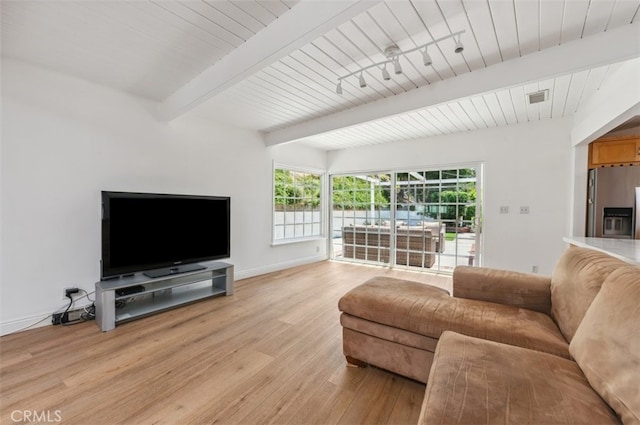 4950 Dunman Ave, Woodland Hills, CA 91364 - living room featuring light wood-style floors, baseboards, and wood ceiling with exposed beams